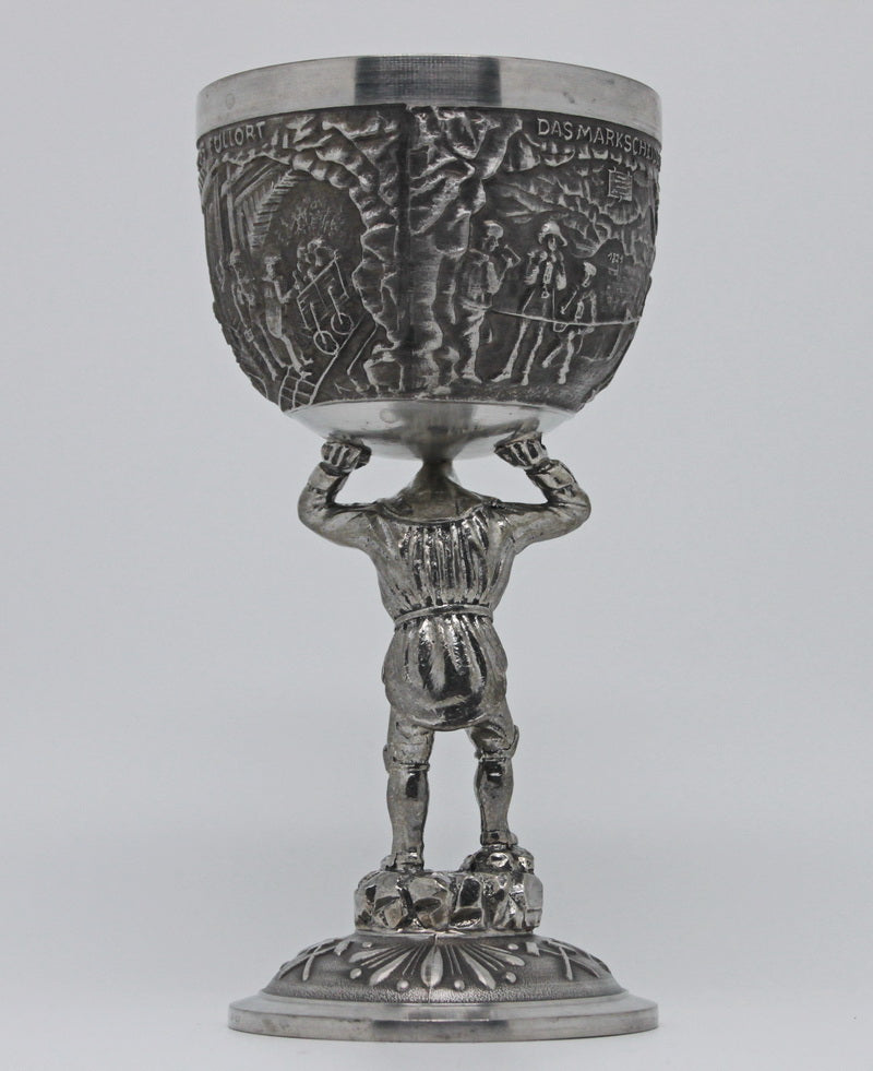 A large vintage tin wine goblet of an unusual form factor