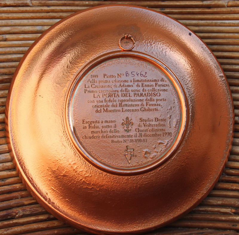 Beautiful wall plate depicting the creation of adam