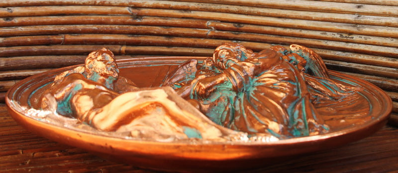 Beautiful wall plate depicting the creation of adam