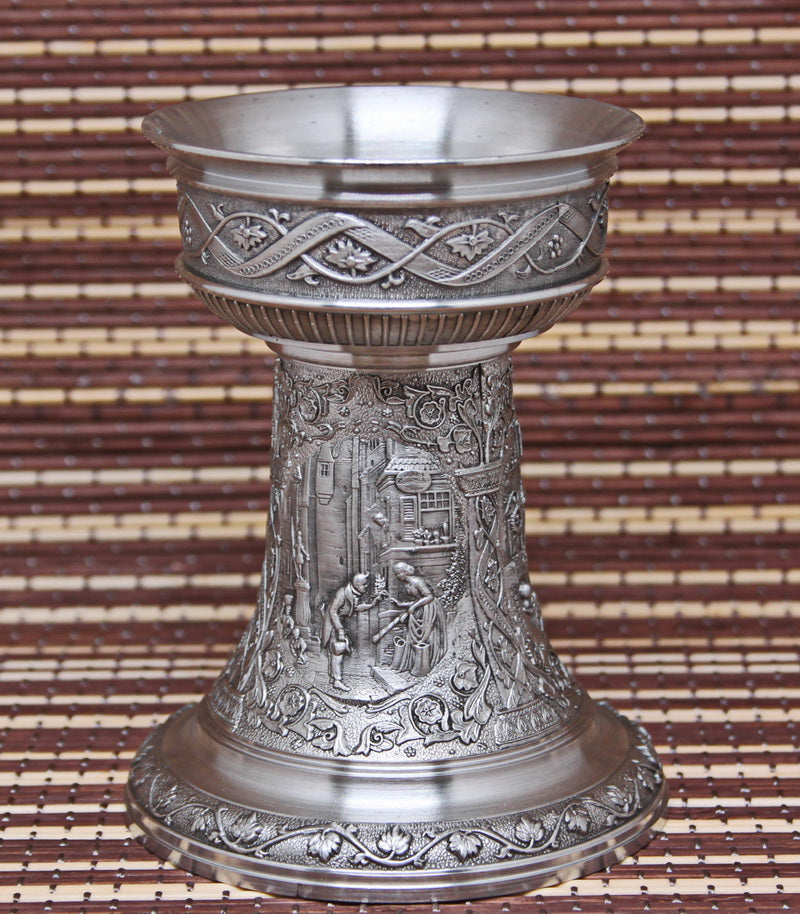 Vintage pewter candlestick. Bas-reliefs of paintings by K. Spitzweg