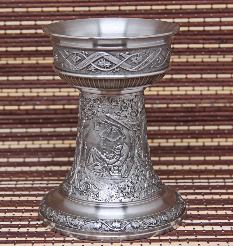 Vintage pewter candlestick. Bas-reliefs of paintings by K. Spitzweg