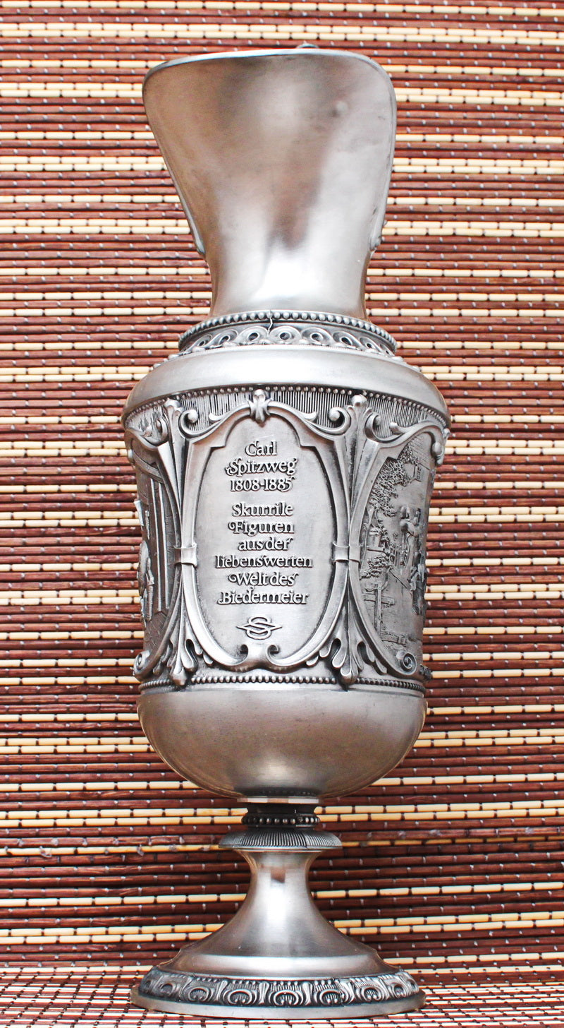Pewter vintage jug. With bas-reliefs. Artist Karl Spitzweg