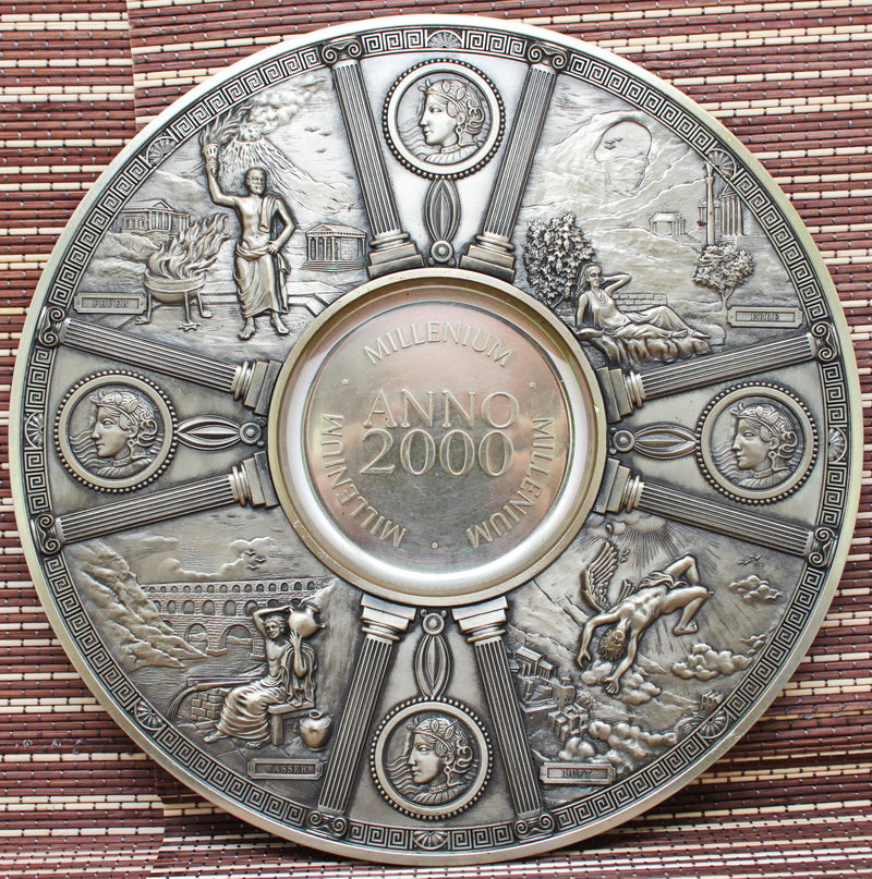 Vintage tin wall hanging. "Millennium".