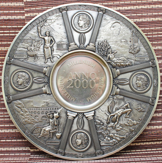 Vintage tin wall hanging. "Millennium".