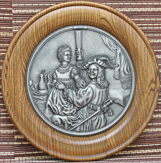 Large tin medallion in a wooden frame. Bas-relief. Rembrandt