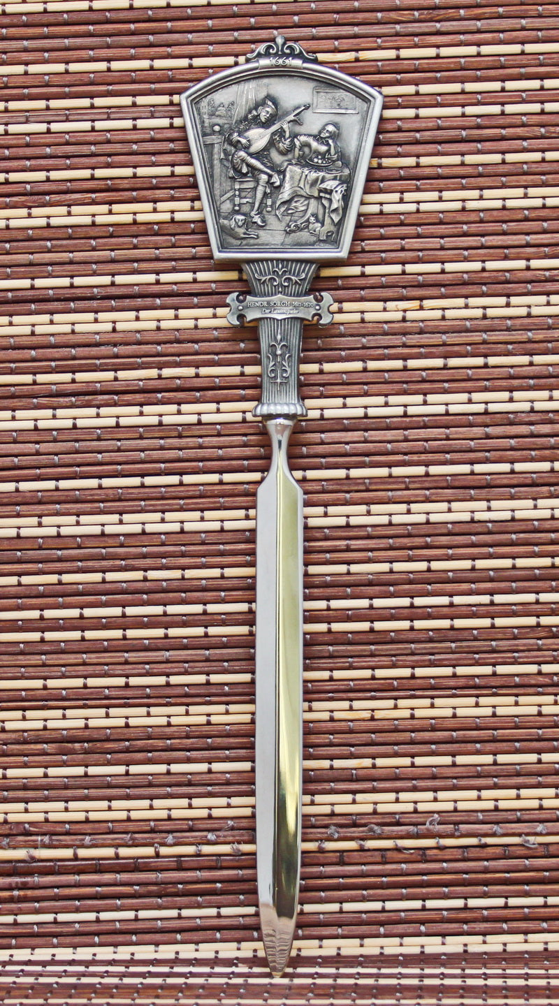 Vintage letter (paper) knife. With bas-relief